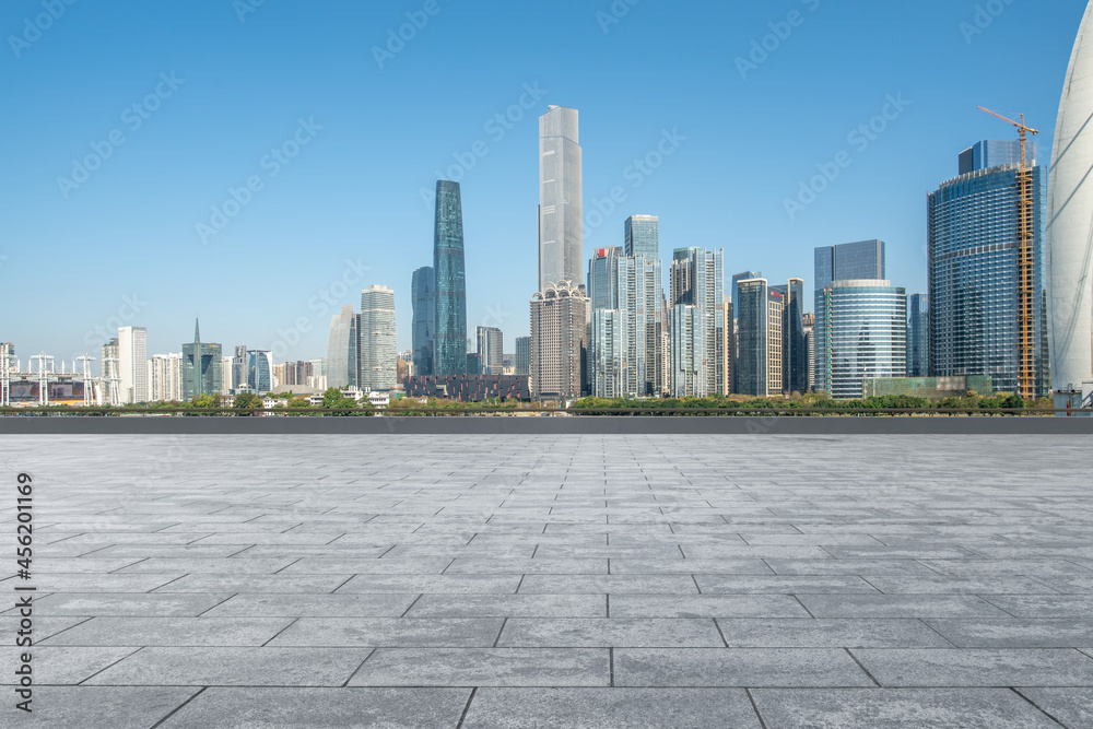 Square floor tiles and city buildings background