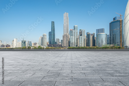Square floor tiles and city buildings background © 昊 周