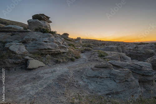 Sunrise over Writing on Stone Provincial Park in the Milk River Valley, Alberta, Canada photo