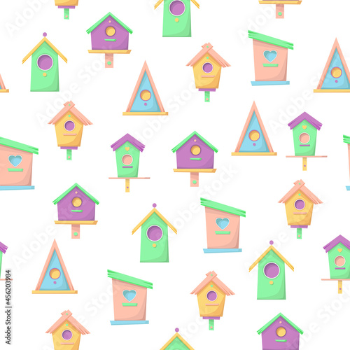 Seamless pattern on a white background. Crafts made of wood and nails. Bird Day. Wooden colorful birdhouses. Birdhouse, bird feeder of various shapes. A set of icons.