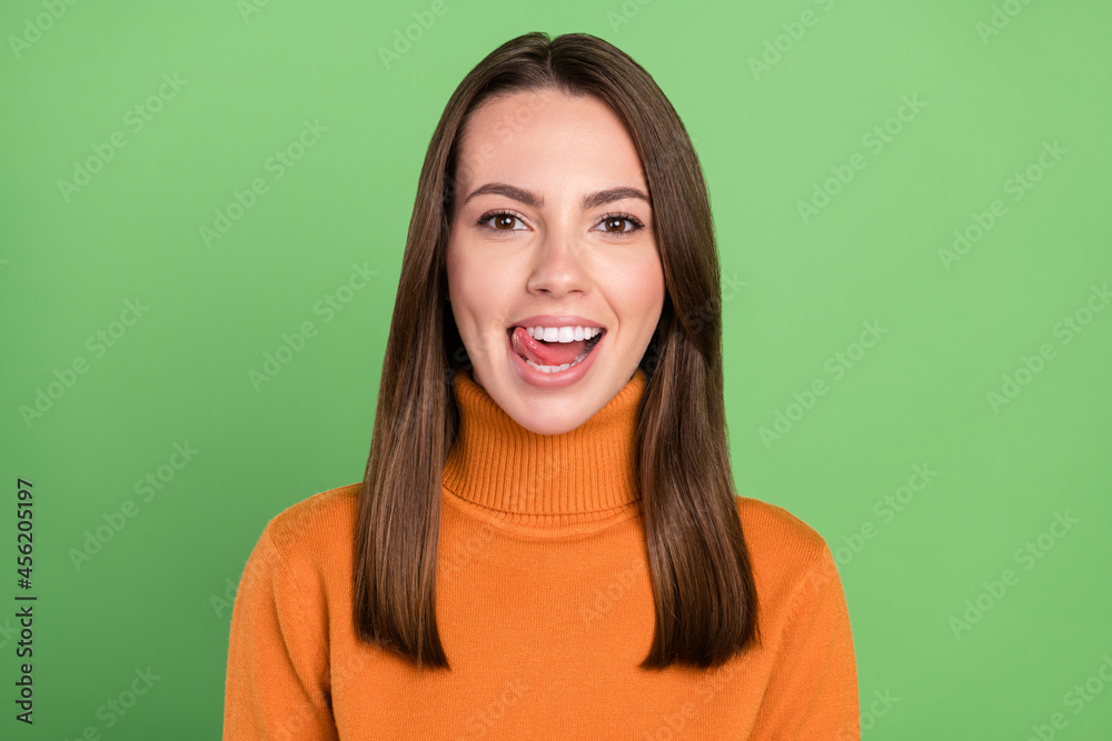 Fototapeta premium Photo portrait woman wearing casual outfit smiling licking lips isolated pastel green color background