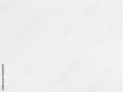 Seamless texture of white cement wall a rough surface, with space for text, for a background..