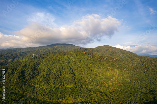landscape with tropical jungle, mountains and clouds