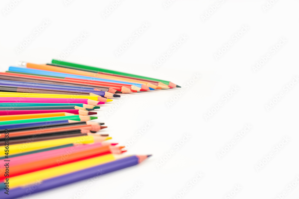Color pencils isolated on white background. School supplies, creativity concept Color pencils isolated on white background. School supplies, creativity concept