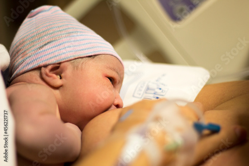 Laid directly on the mother's bare chest after birth, Skin to skin