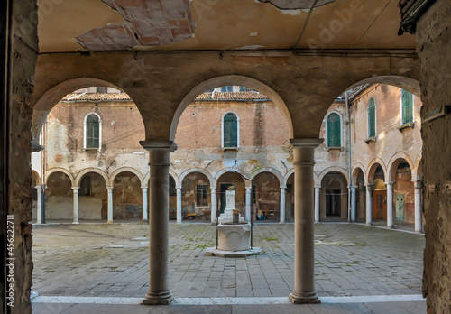 Inner courtyard with marble arches in Venice, Italy