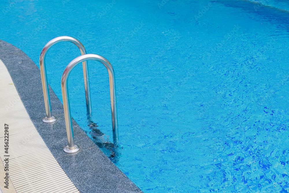 stainless steel ladder and swimming pool