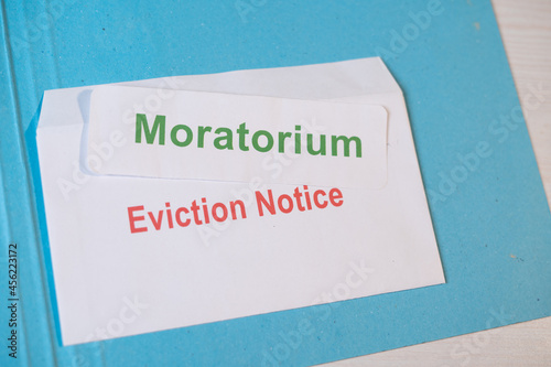 Obraz na płótnie Concept showing Moratorium for evictions by showing eviction notice on table during coronavirus or covid-19 pandemic