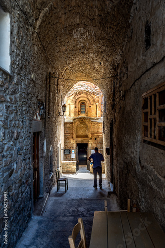 Traditional houses and churches decorated with the famous geometric scratch patterns in the medieval mastic village of Pyrgi on the island of Chios, Greece © gatsi