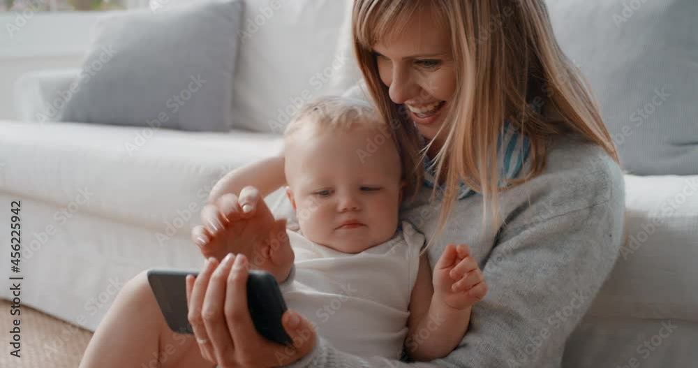 mother and baby video chat using smartphone happy mom holding toddler sharing motherhood lifestyle with friend on social media enjoying mobile technology 4k mother and baby video chat using smartphone happy mom holding toddler sharing motherhood lifestyle with friend on social media enjoying mobile technology 4k