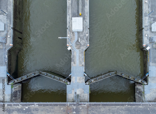 Aerial symmetrical top down view of lock on Albert Canal in Antwerp photo