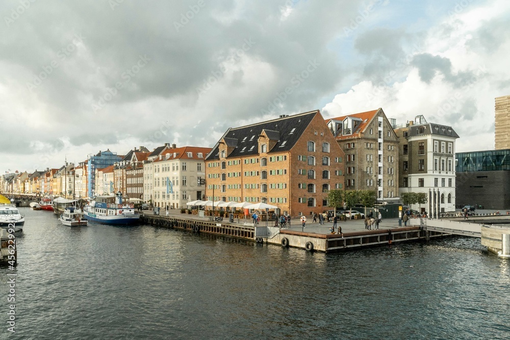 Copenhagen, Denmark. September 26, 2019: Landscape in Nyhavn with with canals and colorful architecture.
