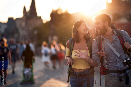 Happy tourist couple taking a selfie; Traveller lifestyle