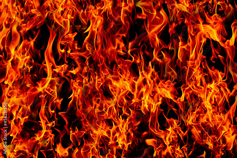 orange bonfire on black background orange bonfire on black background