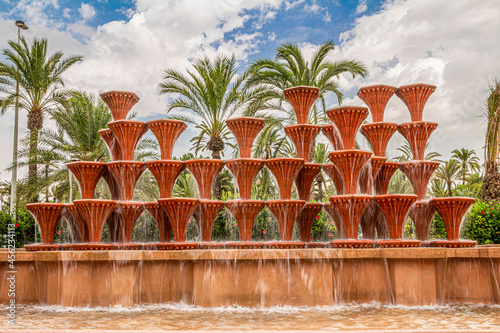 Fountain inside of El Palmeral municipal park in Elche. (formerly located in the Glorieta of Elche) Alicante, Spain. photo