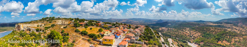 Panoramic view of Monteleone Roccadoria under a cloudy sky