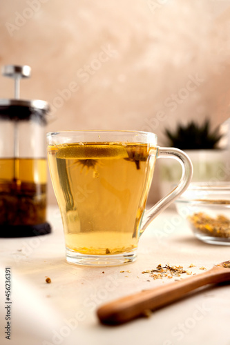 Herbal tea glass cups and teapot. Healthy relaxing herbal fresh tea