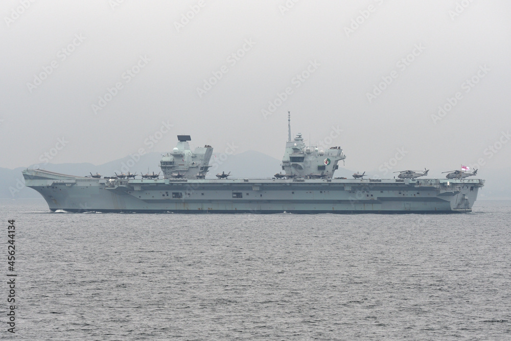 Royal Navy aircraft carrier HMS Queen Elizabeth sailing in Tokyo Bay.
