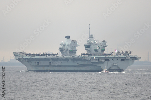 Royal Navy aircraft carrier HMS Queen Elizabeth sailing in Tokyo Bay. photo
