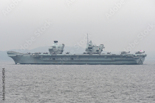 Royal Navy aircraft carrier HMS Queen Elizabeth sailing in Tokyo Bay. photo
