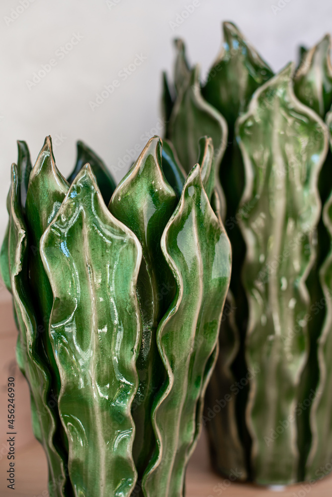 Obraz premium Decorative ceramic vase. Stylish Interior home design. Succulent and cactus plants in pot