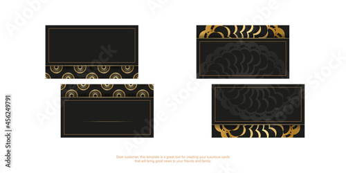Black business card with golden vintage pattern