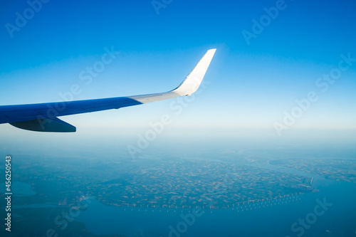 Amsterdam, Netherlands - 17 July 2021: KLM Plain wing over Holland. Flight from Amsterdam to Helsinki.