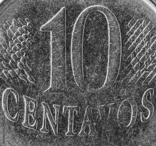 Extreme close up shot of 10 centavos Brazilian coin. photo