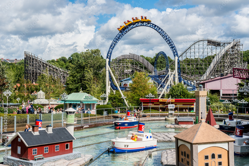 Gothenburg, Sweden - August 12 2013: At Liseberg amusement park. Boat ride  Skepp o' skoj in the foreground. Roller coasters Kanonen and Balder in the  background. Stock Photo | Adobe Stock