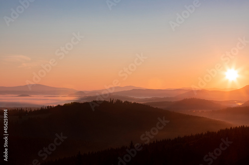 beautiful landscape with a sunrise over the mountains