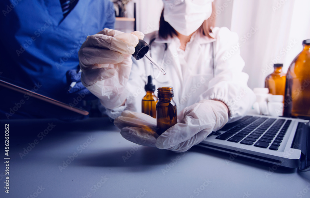 Health care researchers working in life science laboratory and analyzing microscope slides in research lab. New Epidemic Corona Virus. Corona virus outbreaking. Health care researchers working in life science laboratory and analyzing microscope slides in research lab. New Epidemic Corona Virus. Corona virus outbreaking.