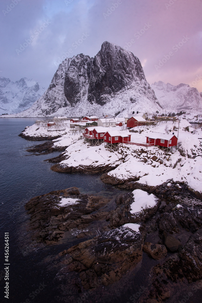 Mountain rural fishing village by the sea ocean winter snow houses