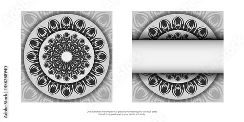 Postcard design White colors with mandala ornament. Design your invitation with space for your text and black patterns.