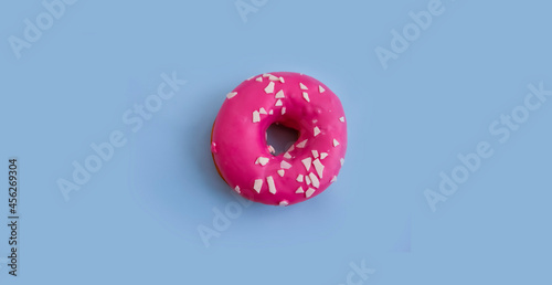 round donut on colored background