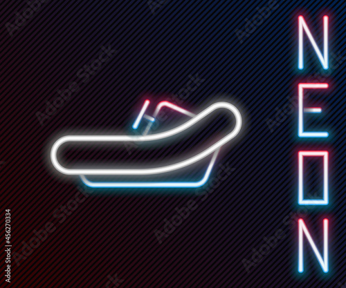 Glowing neon line Rafting boat icon isolated on black background. Inflatable boat with paddles. Water sports, extreme sports, holiday, vacation. Colorful outline concept. Vector