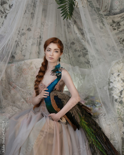 Red-haired girl with a thick braid and a blue peacock