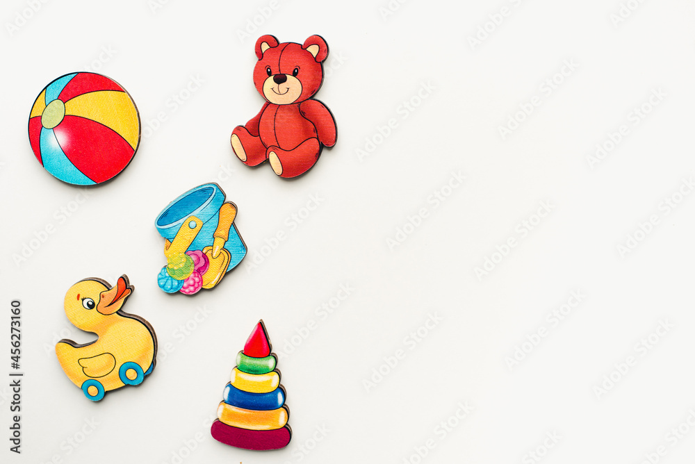 Obraz premium Educational toys on a white background. Wooden toys on a white background. Bright pictures. Wooden pictures. 
