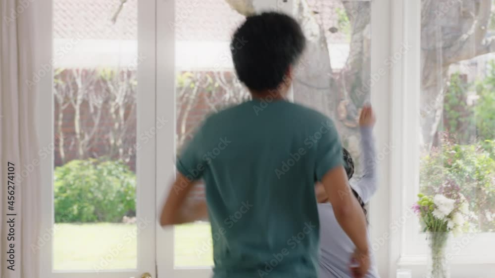 happy father dancing with teenage daughter having fun enjoying playful dance enjoying weekend celebration at home wearing pajamas happy father dancing with teenage daughter having fun enjoying playful dance enjoying weekend celebration at home wearing pajamas