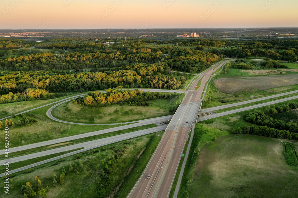 Fototapeta premium Evening Light Over Highway and Clover Leaf