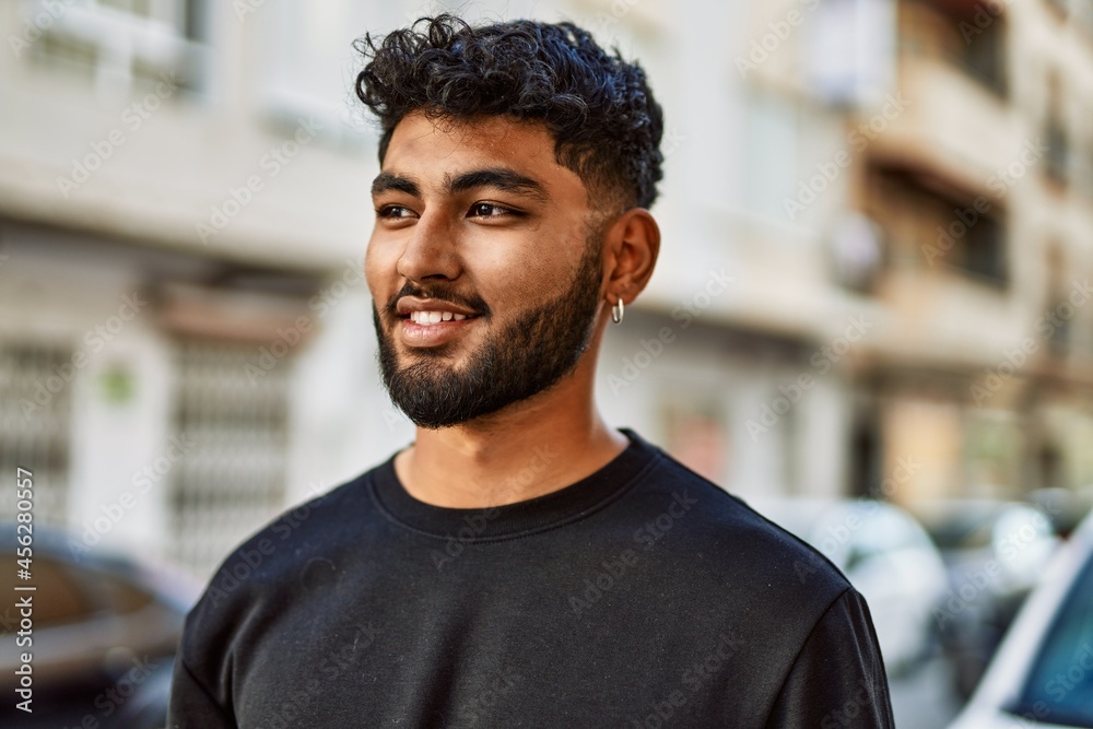 Young arab man smiling confident at street Young arab man smiling confident at street