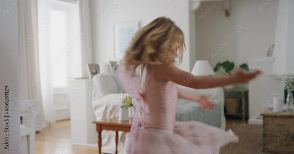 beautiful little girl dancing playfully pretending to be ballerina funny child having fun playing dress up wearing ballet costume with fairy wings at home 4k beautiful little girl dancing playfully pretending to be ballerina funny child having fun playing dress up wearing ballet costume with fairy wings at home 4k
