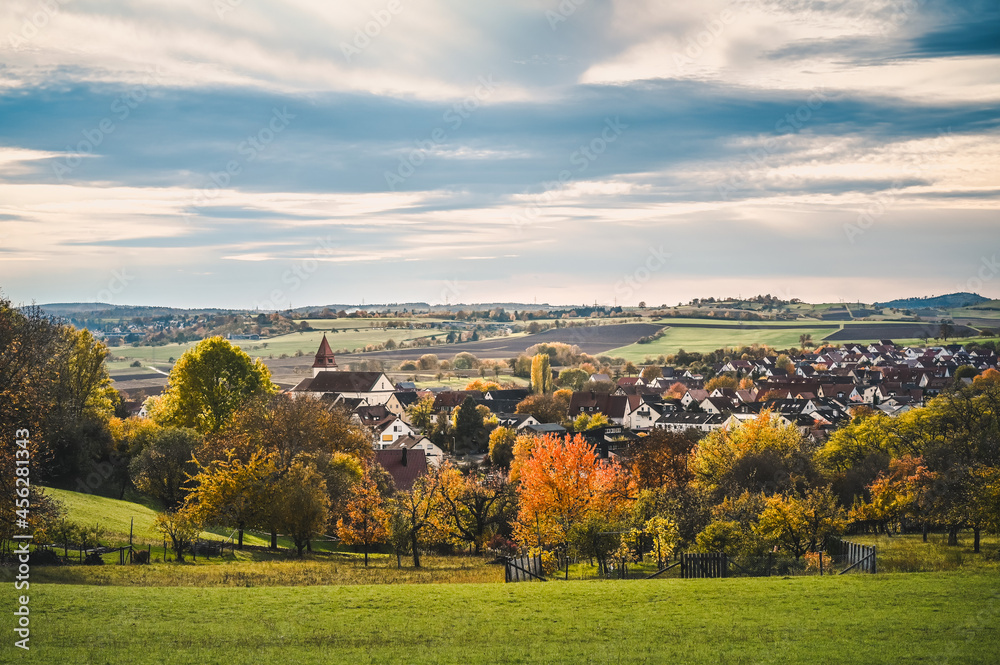View of the village of Wurmlingen, Germany surrounded by the colorful, autumnal countryside.