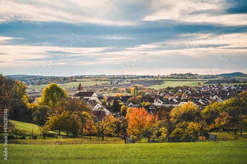 View of the village of Wurmlingen, Germany surrounded by the colorful, autumnal countryside.