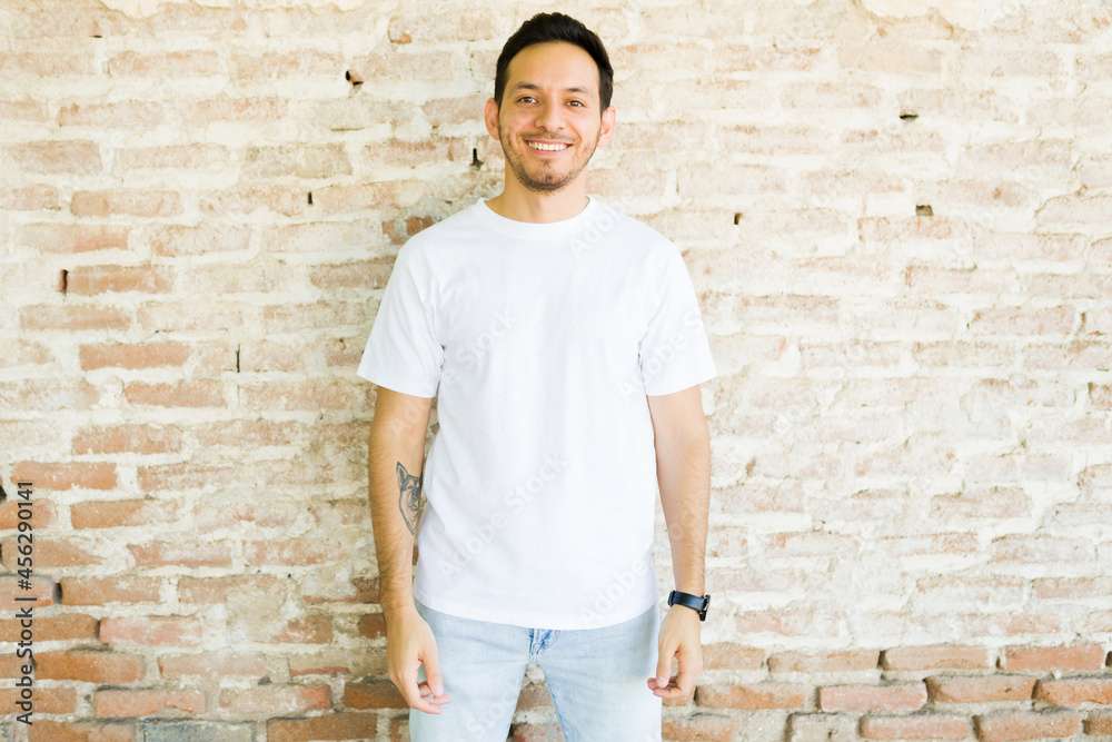 Portrait of a young man with a mock-up t-shirt Portrait of a young man with a mock-up t-shirt