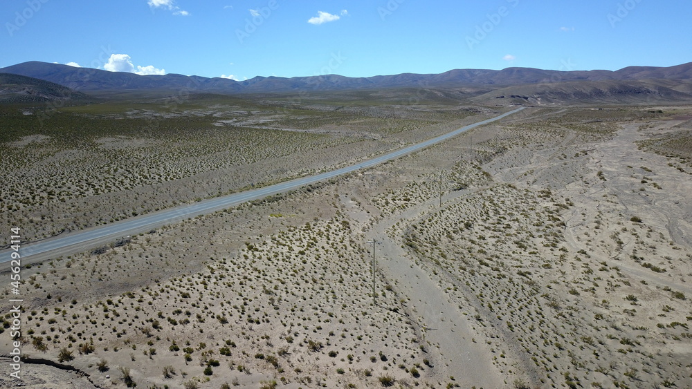 route in desert on high plain shot with drone