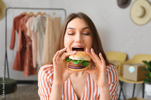 Female seller eating tasty ...