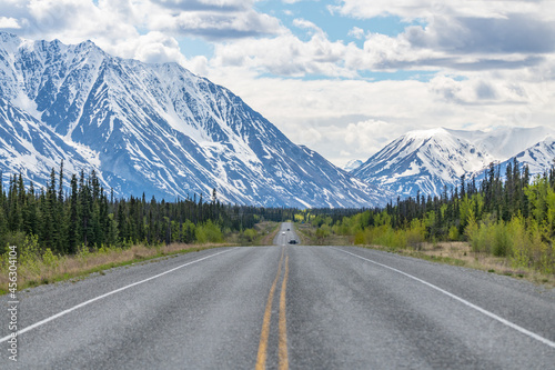 Stunning mountain views along the Alaska Highway in June.  © Scalia Media