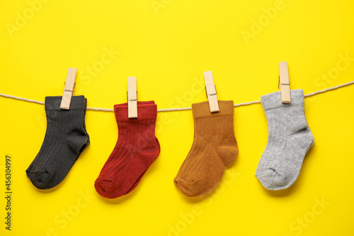Colorful baby socks drying ...