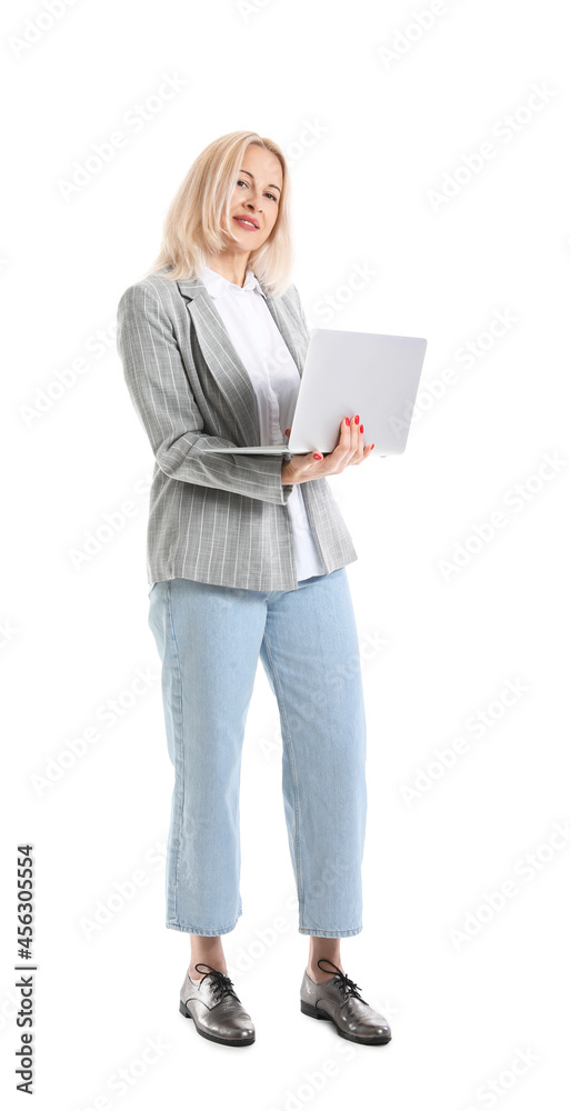 Mature businesswoman with laptop on white background
