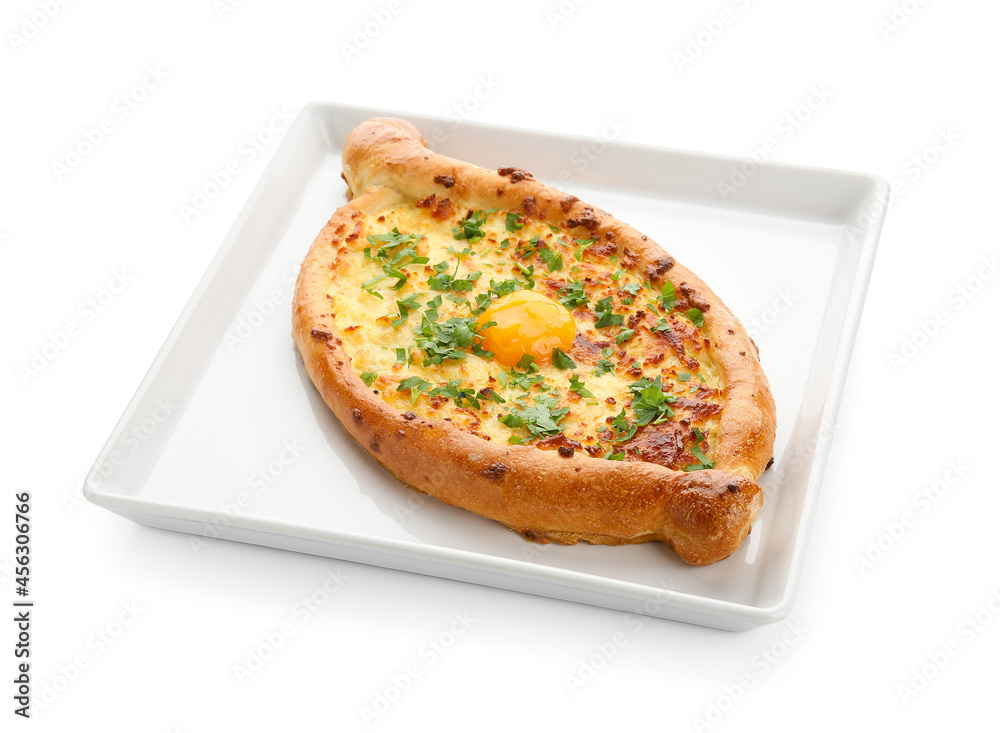 Plate with tasty Ajarian khachapuri on white background Plate with tasty Ajarian khachapuri on white background